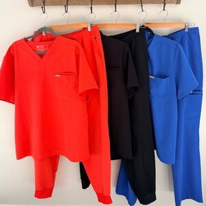 Figs xl scrubs preloved sold as sets (3 of the black sets) small flaw on coral